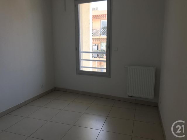 Afficher la photo en grand Appartement F3 à louer - 3 pièces - 62.32 m2 - ST LAURENT DU VAR - 06 - PROVENCE-ALPES-COTE-D-AZUR - Century 21 Rivièra Transactions